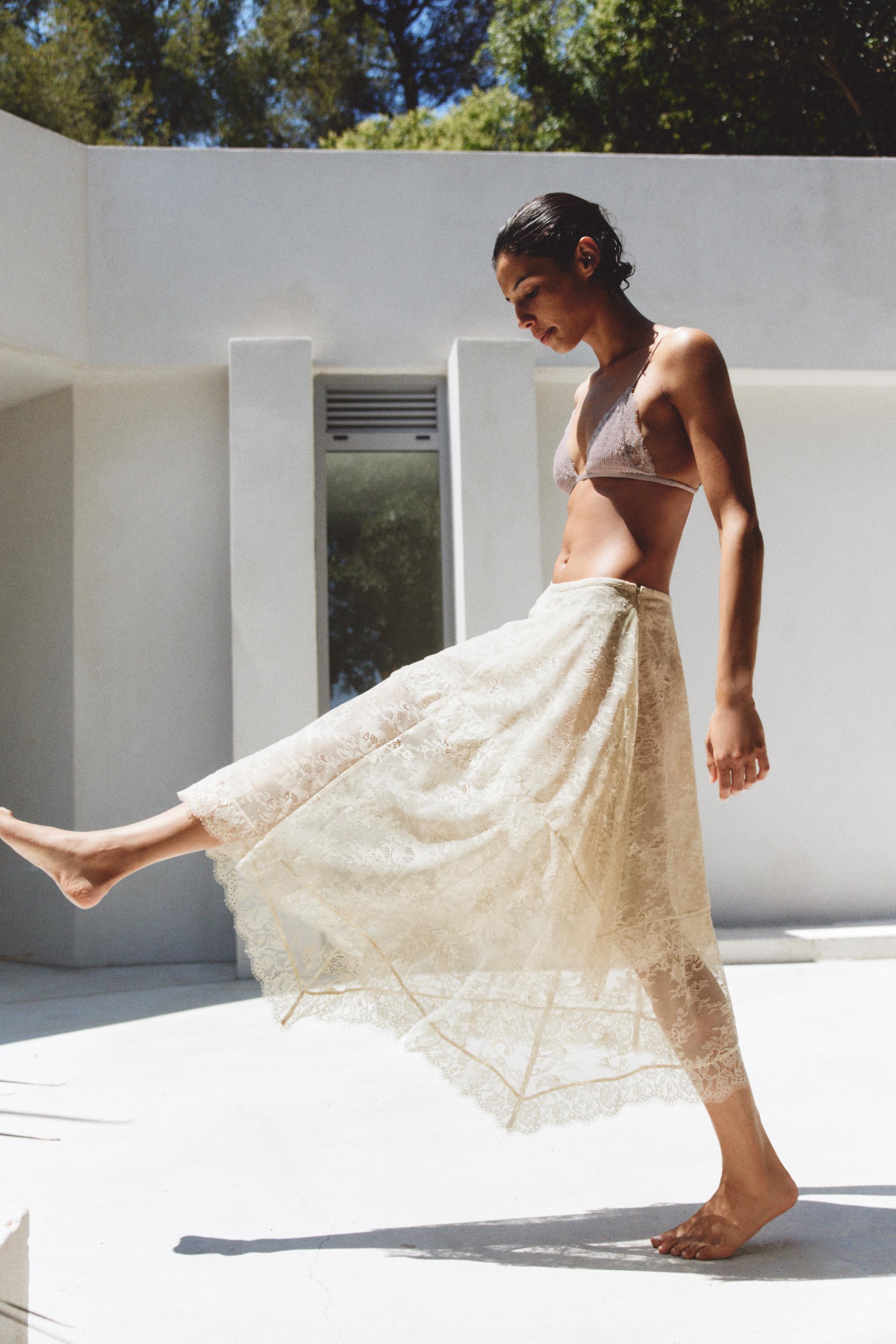 ASYMMETRIC LACE MIDI SKIRT